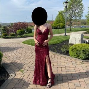 Size 6 Sherri Hill formal prom dress. Color wine. No alterations made.